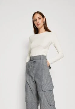 Anna Field Maglietta A Manica LungaOff White Donna T-shirt E Top AN621D18Y-A11 -Moda Sconto 472dc542a76640f5b1b9c22f647a7136